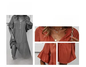 Vue détaillée d'une robe boutonnée à col en V avec manches évasées et jupe à volants