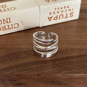 925 sterling silver ring featuring a layered woven design and adjustable open band
