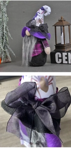 Detail of Halloween gnome hat with spider pattern and black mesh bow decoration