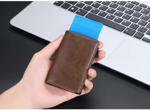 Brown vintage leather RFID card holder with side push mechanism and multi-slot capacity