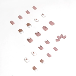 Cute bear press-on nail kit in cream white and brown with 3D cartoon rabbit art