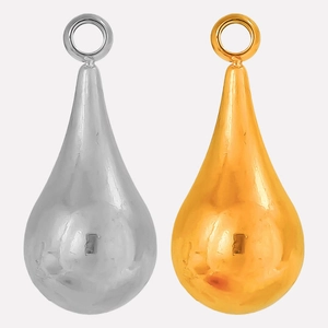 Macro shot of 3D polished gold and silver water drop pendants for jewelry DIY