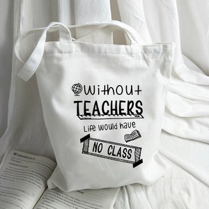 Minimalist white canvas tote bag with teacher quote print and education icons