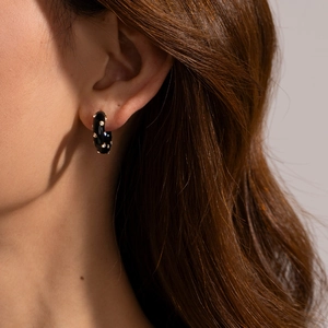 Fashionable C-shaped titanium steel hoop earrings with black enamel and gold rhinestones