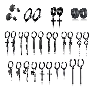 Set of black stainless steel gothic earrings featuring cross, star and chain pendants