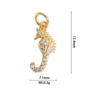 Detail view of gold seahorse pendant with clear zircons, size 15.4mm by 7.1mm