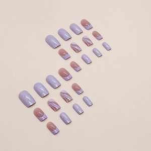 Sparkly purple wavy glitter press-on nails with French almond design and galaxy finish