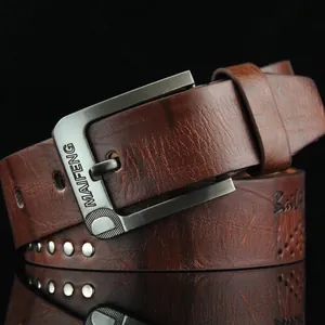 Vintage brown leather men's belt with antique metal pin buckle and rivet details