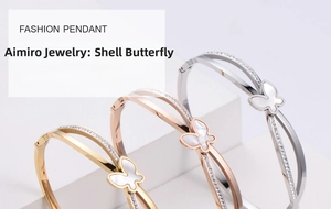 Detailed close-up of shell butterfly bangles in gold, rose gold and silver with micro-pave stones