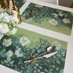 Floral print PVC placemat set with green and white blooming flower patterns for dining decor