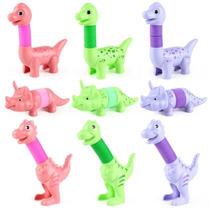 9-piece dinosaur pop tube toy set in pink, green and purple on a white background