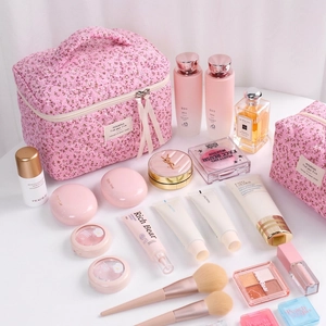 Pink cherry blossom quilted cosmetic bag set for travel toiletries and makeup