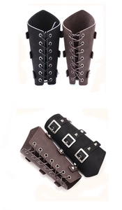 Detail of medieval faux leather arm guards with adjustable buckles and rivet accents