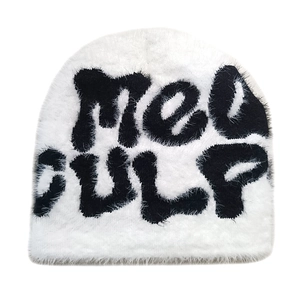 Detail of white faux mink fur beanie showing soft fuzzy texture and black Meo GULP letters