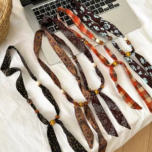 Ethnic bohemian fabric beaded necklace set with paisley and leopard prints
