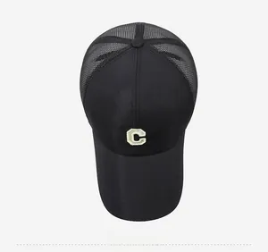 Top view of black quick-dry baseball cap with white embroidered C and breathable mesh back