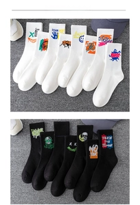 Detail view of cotton athletic crew socks with colorful graffiti and street style patterns