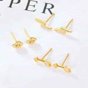 925 silver gold plated stud earrings set with crystal lightning and eye motifs