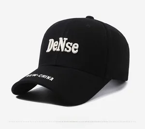 Detail of black cotton baseball cap with 3D DeNse embroidery and New-China brim text