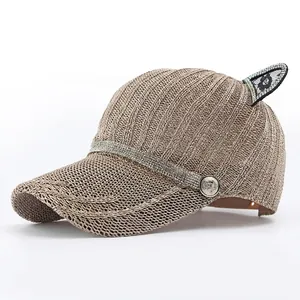 Women's champagne gold knit mesh baseball cap with sequined cat ears and rhinestone trim