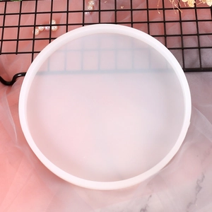 Top view of a round translucent silicone mold for DIY crystal epoxy resin jewelry making