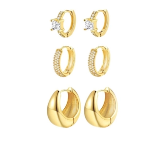 Three-piece gold earring set featuring cubic zirconia studs and polished chunky hoops