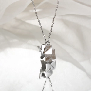 Minimalist silver stainless steel origami elephant pendant necklace with mirror reflection