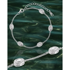 Elegant S925 sterling silver bracelet featuring oval zircon gemstones on a wave background