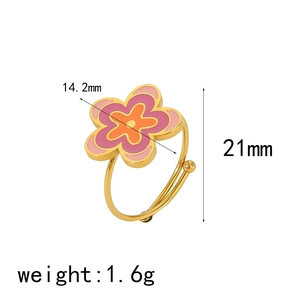 Golden titanium steel flower ring with pink enamel petals, size 14.2mm, weighs 1.6g