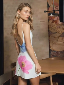 Sling backless A-line mini dress in white with pink and blue floral print for summer