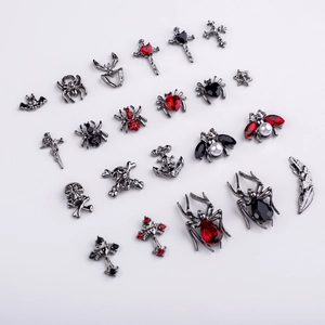 Gothic nail charms set featuring dark silver skulls crosses spiders and bats