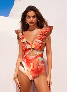Detail of floral one-piece swimsuit featuring ruffle shoulders and waist cutout design