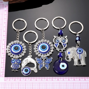 Portachiavi vintage con gufo e delfino malocchio decorati con strass e perline blu