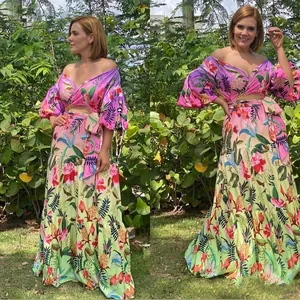 Vestido largo con estampado tropical floral, hombros descubiertos, mangas abullonadas