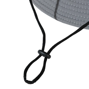 Detail of adjustable windproof drawstring and plastic cord lock on a grey sun hat