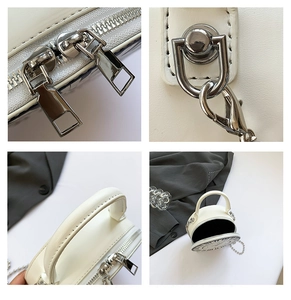 Detailed views of the white round clock bag showing silver hardware and premium leather texture