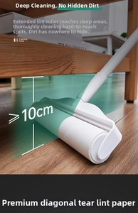 Long handle lint roller cleaning floor dust and pet hair under wooden furniture