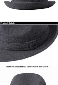Detail view of the rolled brim and dark gray wool felt texture of the gentleman fedora