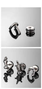 Detailed macro view of stainless steel mermaid and turtle studs with secure screw backs