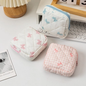 Quilted cotton cosmetic bags with butterfly patterns and pink checkered design