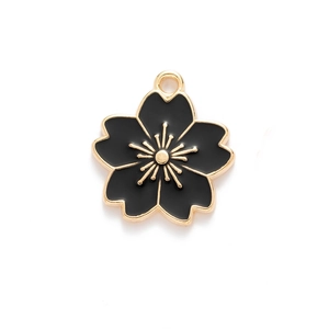 Detail of cherry blossom pendant with black enamel finish and gold alloy plating