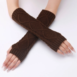 Close-up of brown knit diamond pattern arm warmers with ribbed cuffs for winter