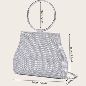 Detailed view of silver rhinestone evening bag with dimensions including metal handle