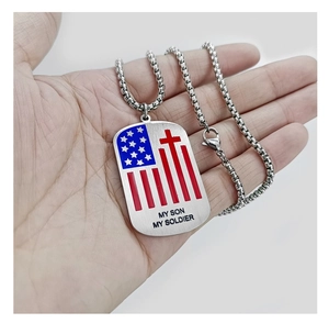 Detail of silver soldier tag necklace with US flag and 'My Son My Soldier' engraving