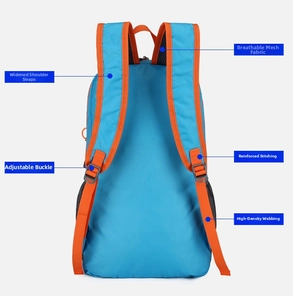 Detail of breathable mesh back and reinforced shoulder straps on blue outdoor backpack