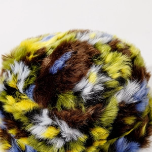 Colorful patchwork faux fur bucket hat with thick plush texture for winter warmth
