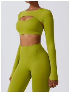 Detail of avocado green yoga shrug with thumbhole cuffs and high elasticity fabric