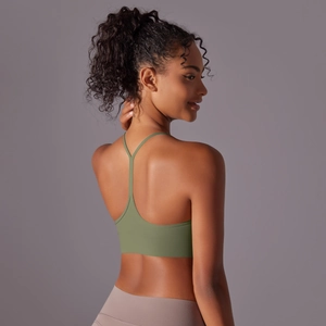 Detail of olive green racerback sports bra with slim straps and Y-shaped back design