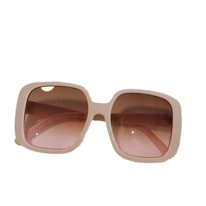 Pink Y2K heart sunglasses with gradient brown lenses and oversized jelly frames