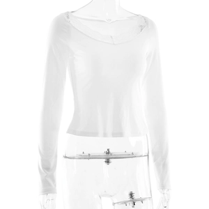 Detailed view of the elegant V-neckline with lace patchwork on a white long sleeve shirt